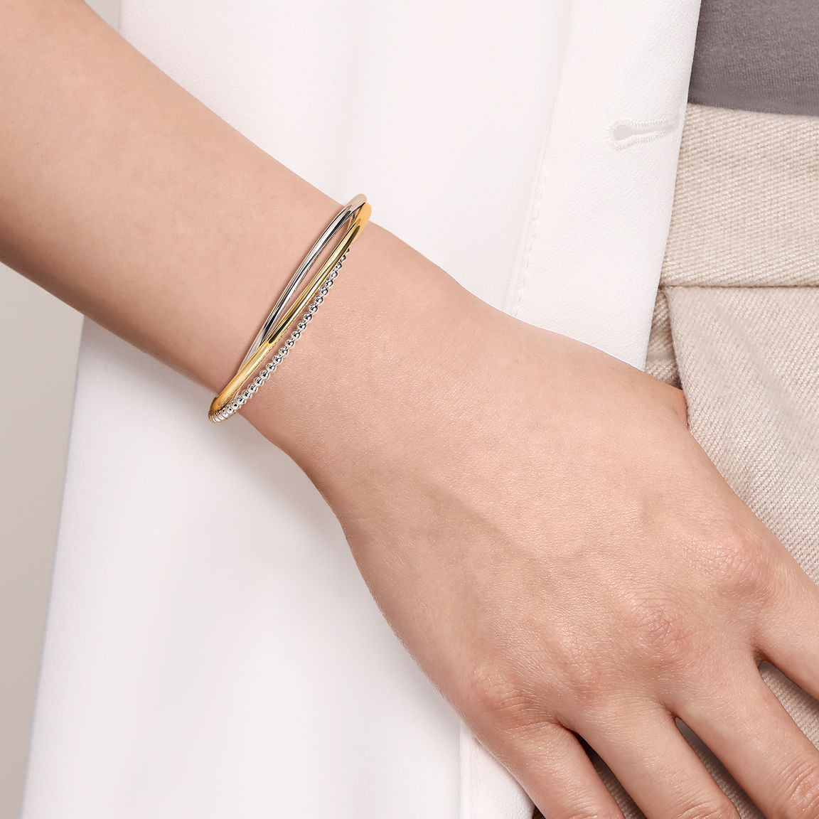 Gabriel & Co. 925 Sterling Silver and 14K Yellow Gold Bujukan Twisted Bangle Bracelet BG5043-62MZJJJ