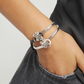 Brown leather bracelet with butterfly ornament PUL2614